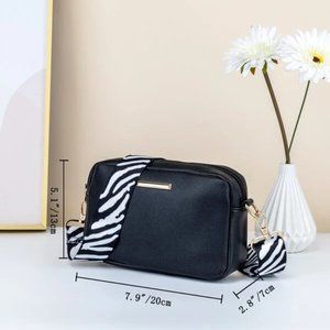 New Mini Crossbody with zebra guitar strap